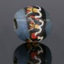 Ancient Egyptian mosaic glass bead with lotus pattern